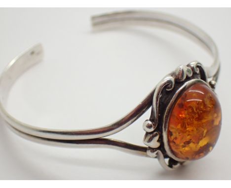Silver cabochon oval amber set bangle