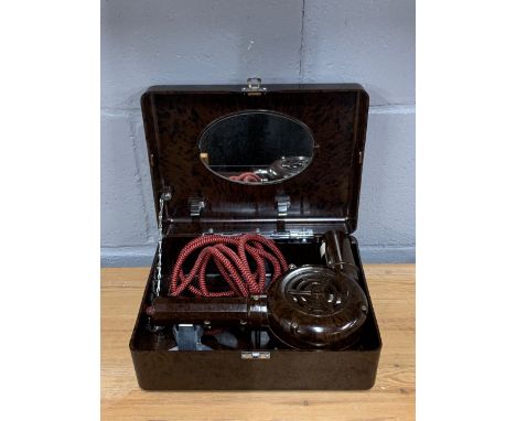 A bakelite hairdryer and case. Collectors item only, not for use.