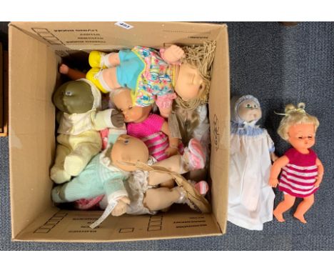 A collection of vintage Cabbage Patch and Tiny Tears dolls.