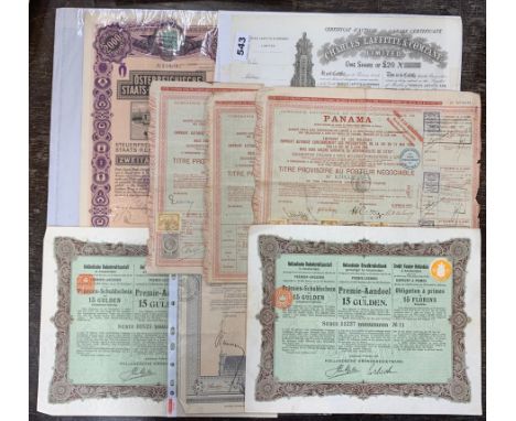 A group of early share certificates.
