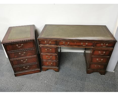 A leather topped mahogany veneered kneehole desk (120 x 60 x 77cm) together with a matching leather topped filing cabinet.