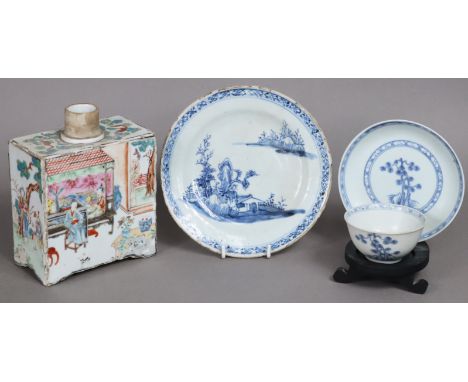 An early 19th century Chinese famille rose porcelain tea caddy of rectangular form, painted with figure scenes to each side, 