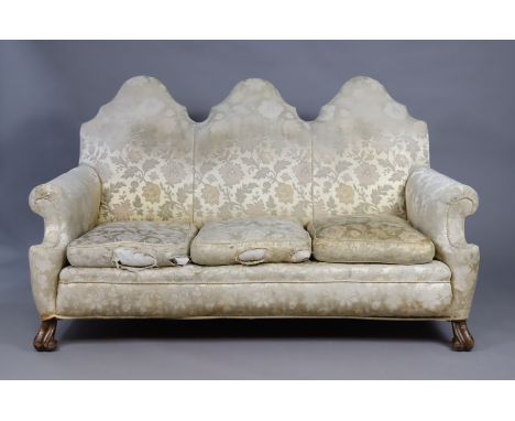 An early 20th century William &amp; Mary-style three-piece suite upholstered gold coloured floral silk damask, with shaped ba