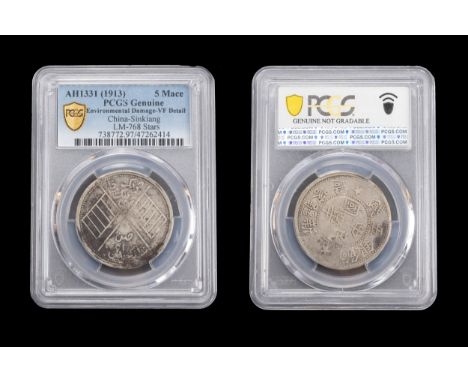 A CHINESE SILVER COIN, SINKIANG, KASHGAR, YEAR 1912. 5 Mace. PCGS VF. 3.2cm diam. In coin grading case. 