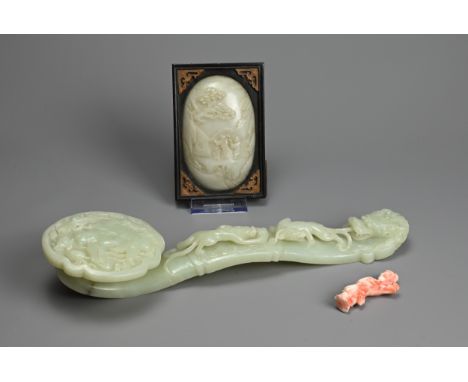 A CHINESE JADE RUYI SCEPTRE WITH MIRROR AND CORAL FIGURE. The ruyi sceptre carved in relief with boy holding a carp surrounde