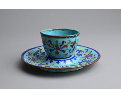 A CHINESE CANTON ENAMEL CUP AND SAUCER, EARLY 20TH CENTURY. Light blue ground decorated with Shuangxi double happiness charac