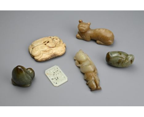 SIX CHINESE JADE CARVINGS. Comprising: a pale jade plaque-shaped pendant, pierced with insects amongst foliage, a dark mottle