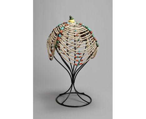 A TIBETAN WOMAN'S HEADDRESS, POSSIBLY AMDO REGION, 20TH CENTURY. Also known as a Jugin. Open work with pearls, turquoise and 