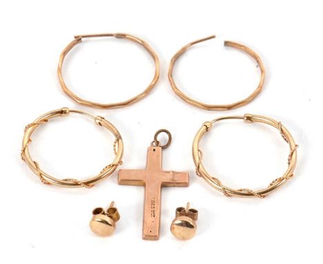 A mixed lot of yellow metal jewellery: to include a cross pendant stamped 9ct, two pairs of unmarked earhoops, and a pair of 
