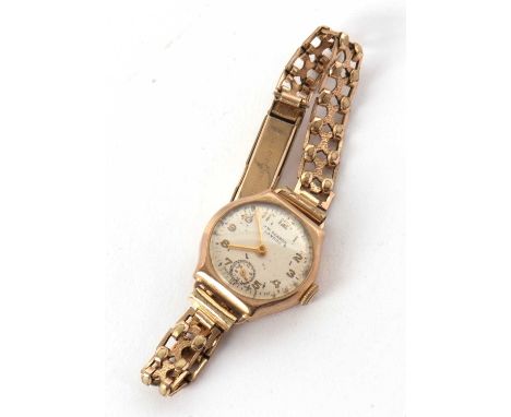 A lady's JW Benson 9ct cased wristwatch, on rolled gold strap