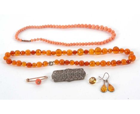 A mixed lot of jewellery: to include a graduated coral bead necklace with barrel clasp stamped 9ct, 37cm long, 19g; a late 19