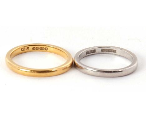 Two wedding bands: to include a 22ct ring, hallmarked London 1949, size M, 3.8g; and a rign stamped 'PLATINUM', size L, 3.7g,