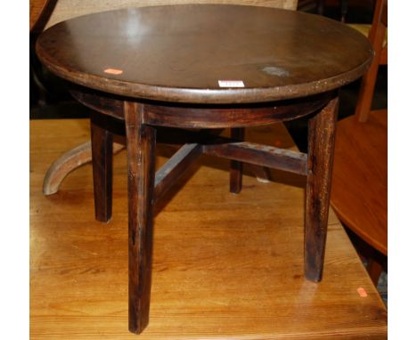 A 19th century mahogany and stained beech circular low occasional table; together with a 19th century oak tilt-top pedestal t