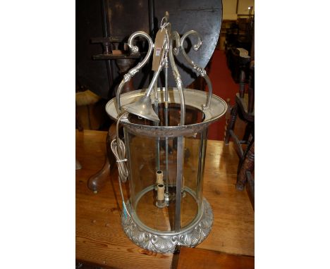 A contemporary cast metal circular four glass hanging three-light ceiling light, drop 100cm