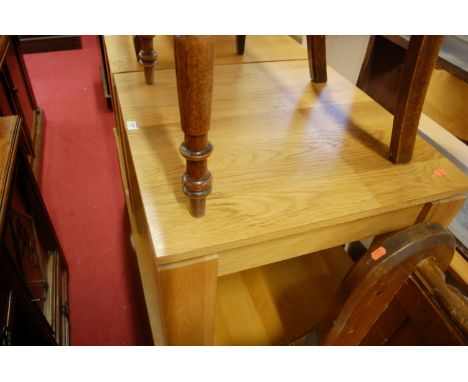 A pair of modern light oak square low occasional tables; together with a similar single drawer rectangular low coffee table (