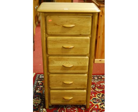 A contemporary light oak narrow round cornered five drawer chest, w.55cm