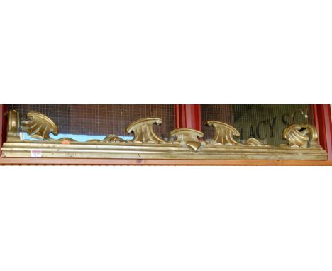 A 19th century polished bronze kerb fender, having scroll outline, w.132cm