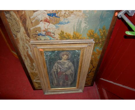 An oak framed woolwork, a gilt framed and bevelled commemorative wall mirror, a Pre-Raphaelite style portrait etc 