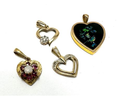 4 x 9ct gold gemstone pendants inc. diamond, opal, garnet &amp; ruby (3g) 