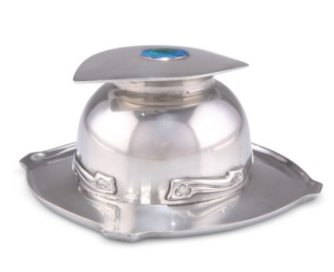 ARCHIBALD KNOX FOR LIBERTY &amp; CO, A TUDRIC PEWTER AND ENAMEL INKWELL, no. 0140, cast in low relief with foliate panels, th