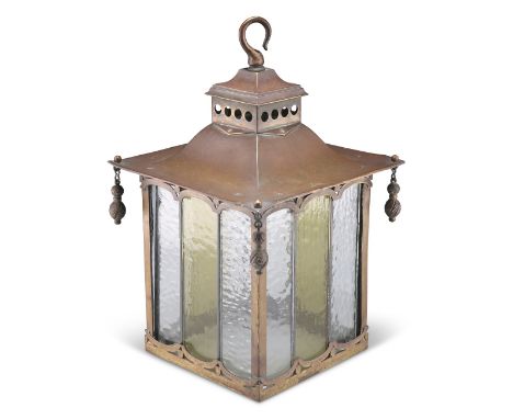 AN ARTS AND CRAFTS COPPER HALL LANTERN, the&nbsp;pagoda top with pendant drops to the corners, the rectangular sides with tex