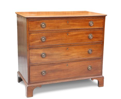 A GEORGE III MAHOGANY CHEST OF DRAWERS,&nbsp;the rectangular top over four long graduated cockbeaded drawers, fitted with cir