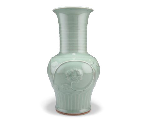 A CHINESE CELADON VASE, with peony scroll decoration. 28cm high