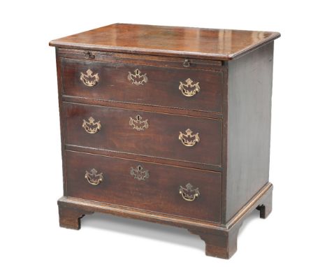 A GEORGE III MAHOGANY CHEST OF DRAWERS, of deep proportions, the moulded rectangular top with rounded corners, over a slide a