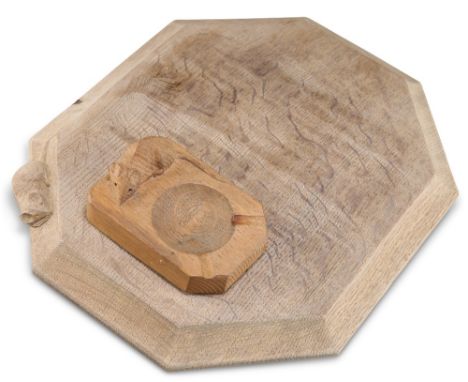 ROBERT THOMPSON OF KILBURN, A MOUSEMAN OAK BREADBOARD, elongated octagonal, adzed top, with carved mouse signature, 30.5cm wi