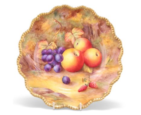 A ROYAL WORCESTER FRUIT PAINTED PLATE, with beaded shaped edge, painted by Price, puce printed factory mark and date code for