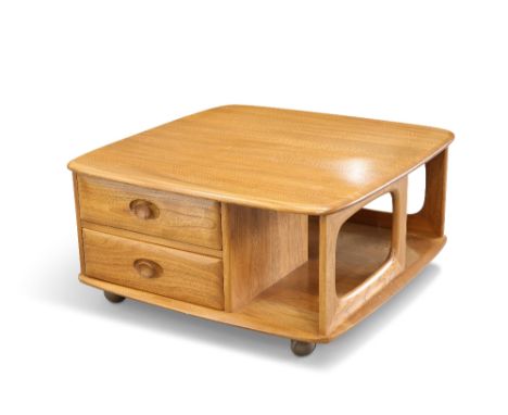 AN ERCOL 'PANDORA'S BOX' LIGHT ELM COFFEE TABLE, rounded square form, fitted with two drawers, moving on castors. 39.5cm high