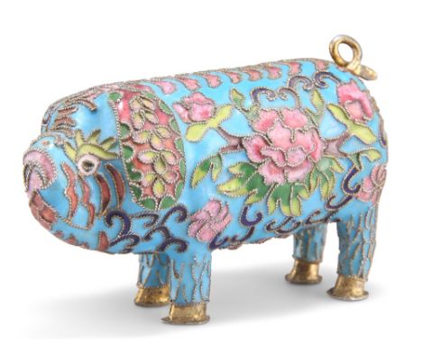 A CHINESE CLOISONNE MODEL OF A PIG, enamel decorated with foliage within raised wirework against a turquoise ground. 10cm lon