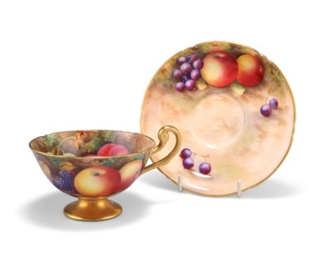 A ROYAL WORCESTER FRUIT PAINTED CUP AND SAUCER, the cup painted by Moseley, the saucer by Townsend, puce printed factory mark