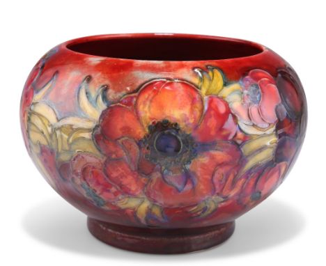 A WALTER MOORCROFT FLAMBÉ&nbsp;POTTERY BOWL, globular&nbsp;form, 'Anemone' pattern, tubelined and hand-painted in tones of re