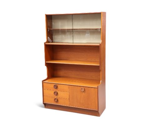 A 1970S TEAK WALL UNIT, with sliding glass doors, cupboard and drawers, integral light, unsigned. 65cm high, 101cm wide, 43cm
