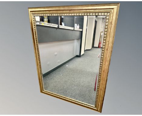 A contemporary gilded mirror, 108cm by 136cm 