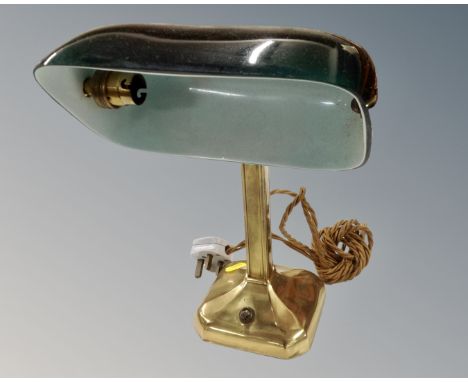 A vintage brass banker's desk lamp with green glass shade 