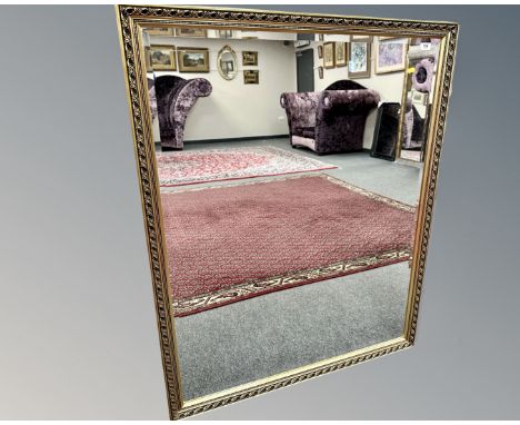 A contemporary gilded mirror, 100cm by 128cm 