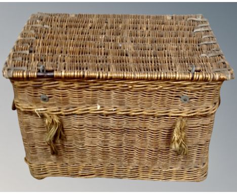 A vintage wicker laundry hamper. (width 87cm)