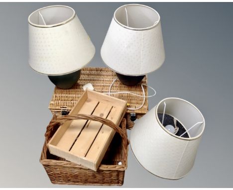 A wicker hamper, a wicker wine basket, a pine trough and three contemporary table lamps.