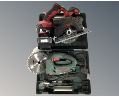 A Milwaukee Red Lithium-ion electric handsaw with battery, charger and extra cutting disc together with a Bosch jig saw in ca