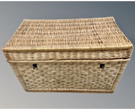 A vintage wicker hamper. (width 83cm)
