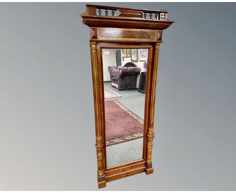 A Continental mahogany mirror, 81cm by 179cm.