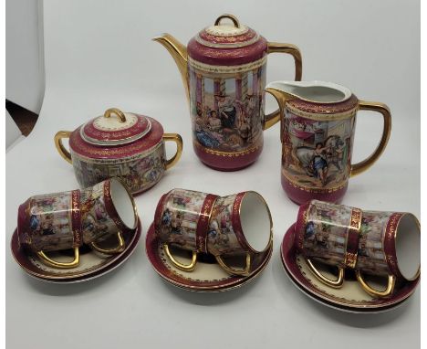 A Czechoslovvakia coffee set circa 1925 , decorated with transfer prints on a claret ground and enriched with gilding . Consi