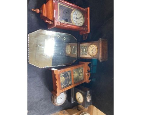 4 clocks and a barometer one heavy slate and a vintage etched mirror.