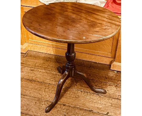 A George III and later tilt top table, circular top, turned column, raised on tripod cabriole legs on paw feet. 72cm H x 72cm