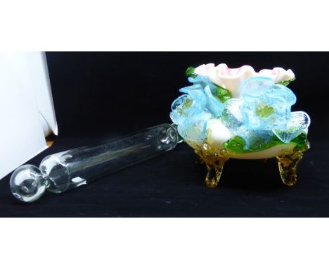 A Victorian coloured glass bowl with frilled border applied with flowers and on four shaped legs, 17cm high and a clear glass