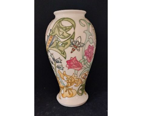 A modern Moorcroft pottery "Red Tulip" pattern baluster vase, impressed "Moorcroft, Made in England" and painted WM&nbsp; c93