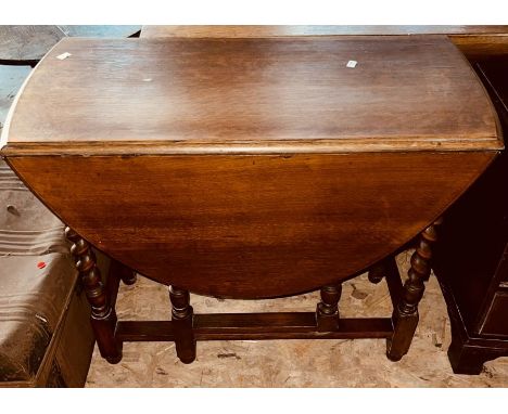 A Victorian revival oak barley twist gate-leg table.&nbsp;