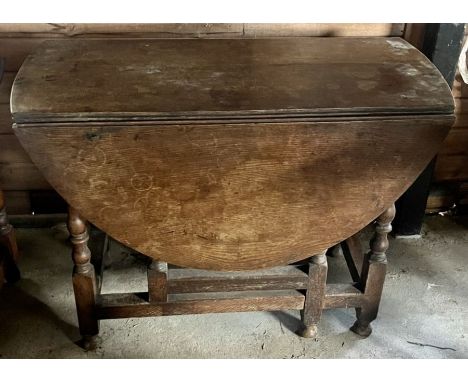 An 18th century and later oak gate-leg table.&nbsp;